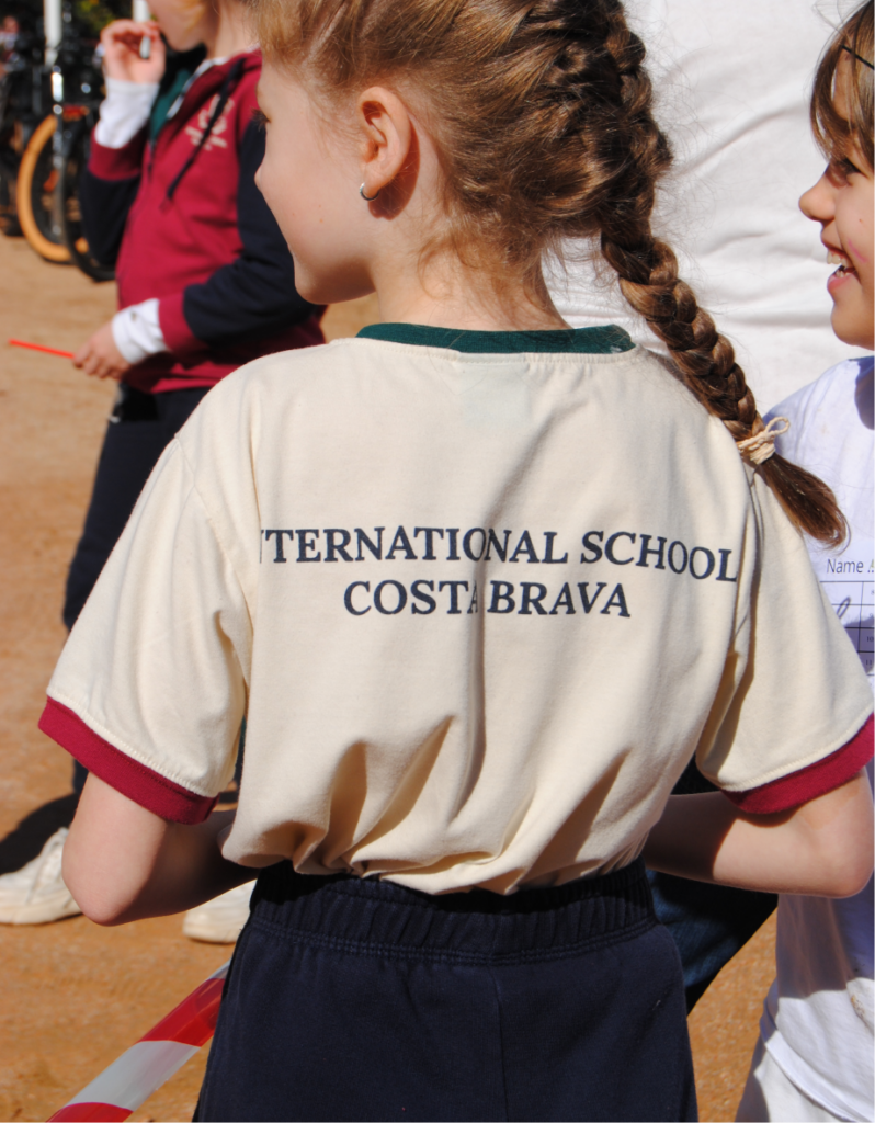 Primary student backwards with iscb uniform
